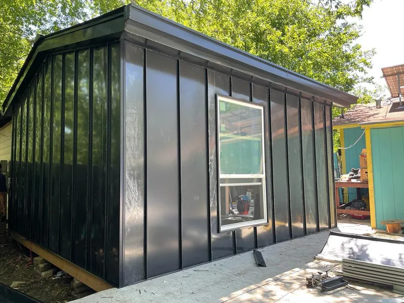 Black standing seam metal wall panels for Roof Inspection in Northwood